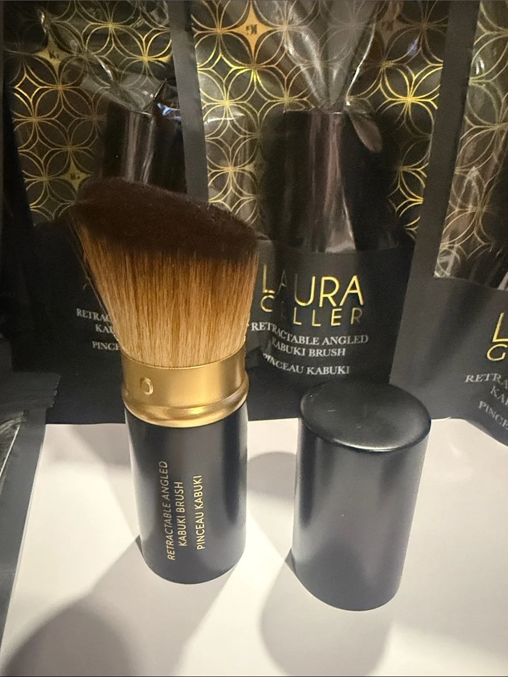 Laura Geller Black and Gold Retractable Angled Kabuki Brush brand new